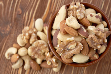 Mix nuts  on wooden  background