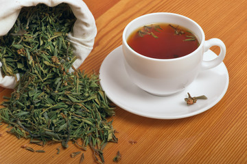 Herb and healthful tea cup