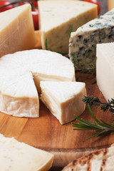 Cheese on wooden platter