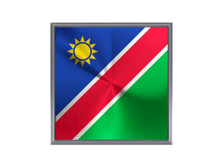 Square metal button with flag of namibia