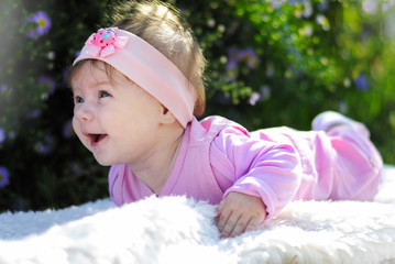 pretty little girl near colors