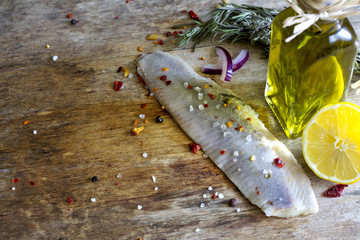 Herring fillet in oil vintage still life food background concept