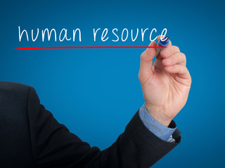 Businessman hand writing Human Resource in the air.  Office