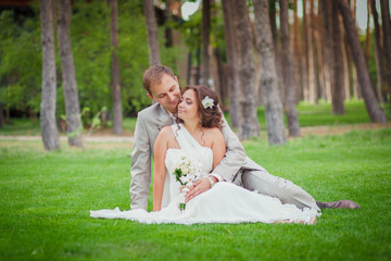 groom and bride sitting