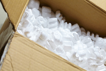 Fototapeta na wymiar packing box with white packaging filling