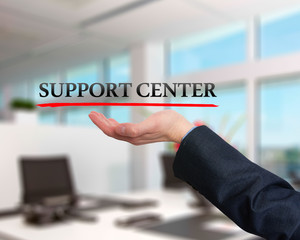 Businessman showing support center sign. Business, technology