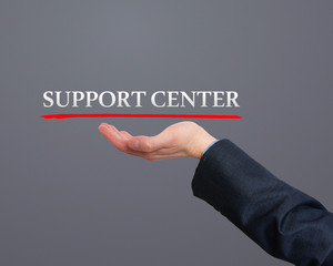 Businessman showing support center sign. Business, technology