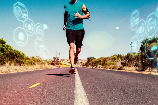 Composite image of athletic man jogging on open road