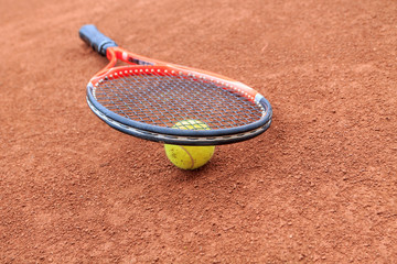 Tennis ball and racket
