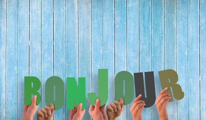 Composite image of hands holding up bonjour © WavebreakMediaMicro