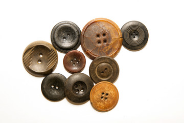 A lot of vintage buttons on  white background