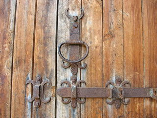 Ancient wooden door rustic metallic detail