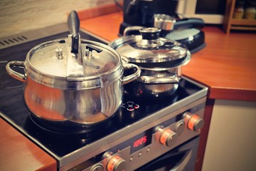 Fototapeta na wymiar kitchen with stove and pots