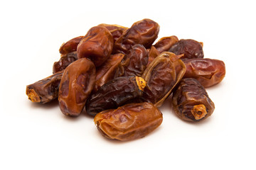 Medjool dates isolated on a white background.