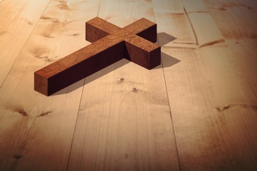 Composite image of wooden cross