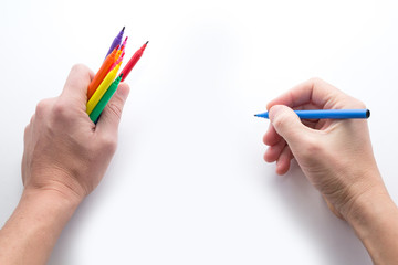 the man's hand, ready to draw a picture