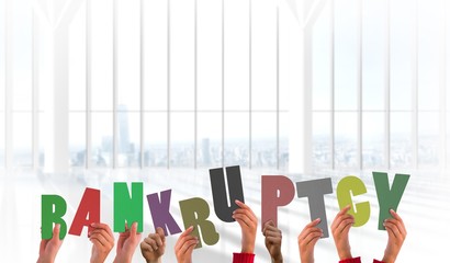 Composite image of hands holding up bankruptcy