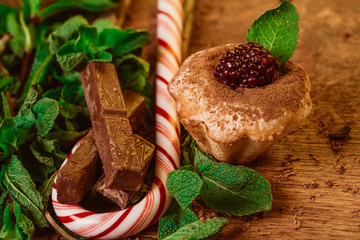 peppermint candy chocolate muffin with blackberries and mint 