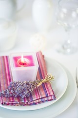 Fototapeta na wymiar Setting. Dining table setting at Provence style, with candles
