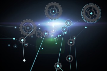 Composite image of cogs and wheels