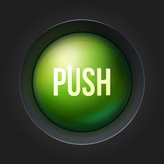 Green push button at dark plactic background