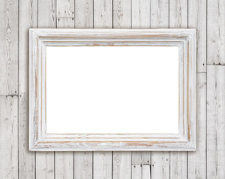 Bleached wooden picture frame on vintage plank wall background