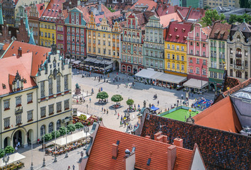 Fototapeta premium People walking on the market square in Wroclaw, Poland.
