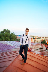 Handsome  hipster guy on the roof