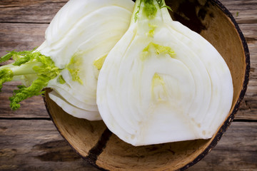 Fennel in the bowl on the wood table. © gitusik