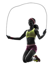 woman exercising fitness jumping rope  silhouette
