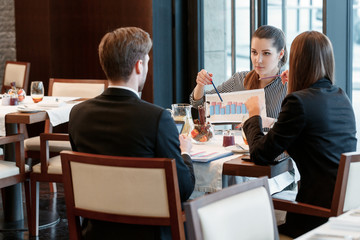 Business discussion at the lunch between colleagues