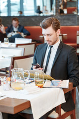 Business manager with the phone