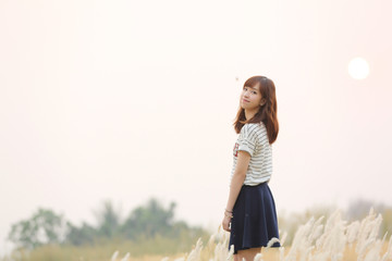 Young woman in meadow