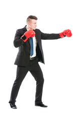 Successful business man fighting like a boxer