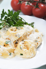 Tortellini pasta in cheese sauce