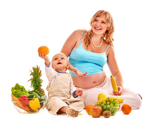 Family pregnant woman preparing food .