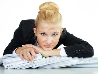 Business woman at work has a headache