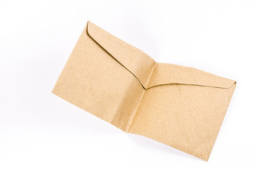 folded brown envelope on white background