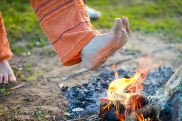 foot in the fire