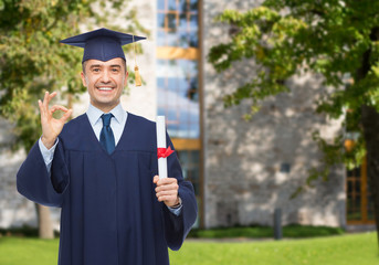 smiling adult student in mortarboard with diploma