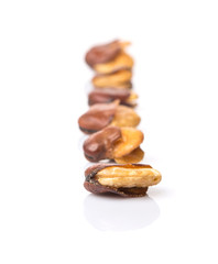 Salted broad beans or vicia faba over white background