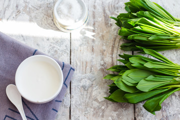 Ramson with sour cream and salt to the light board
