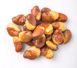 Salted broad beans or vicia faba over white background