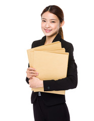 Young business woman holding report