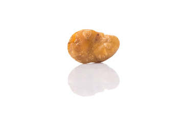 Salted broad beans or vicia faba over white background