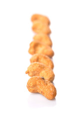 Roasted and salted cashew nut over white background