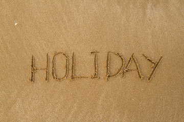 Happy Holidays Message on Beach