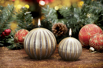 Closeup of colored Christmas candles on colored background