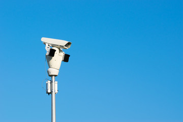 Surveillance Camera and Blue Sky