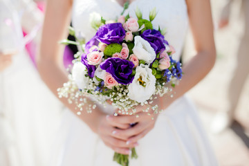 Wedding bouquet with roses and alstromeria
